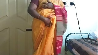 desi  indian horny tamil telugu kannada malayalam hindi cheating wife vanitha wearing orange colour saree  showing big boobs and shaved pussy press hard boobs press nip rubbing pussy masturbation